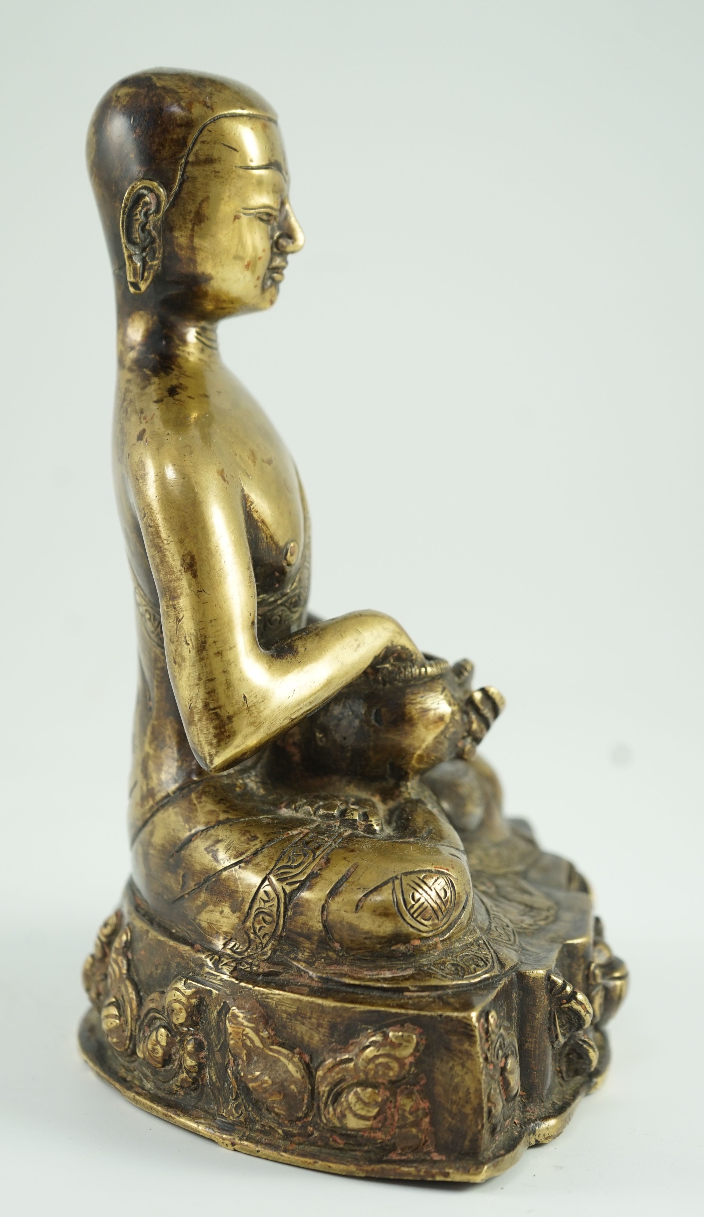 A Himalayan bronze figure of Buddha, 19th century, 21.5cm high